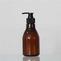 China 250ml Amber Color Plastic Cosmetic Bottles Black Pump For Personal Care factory